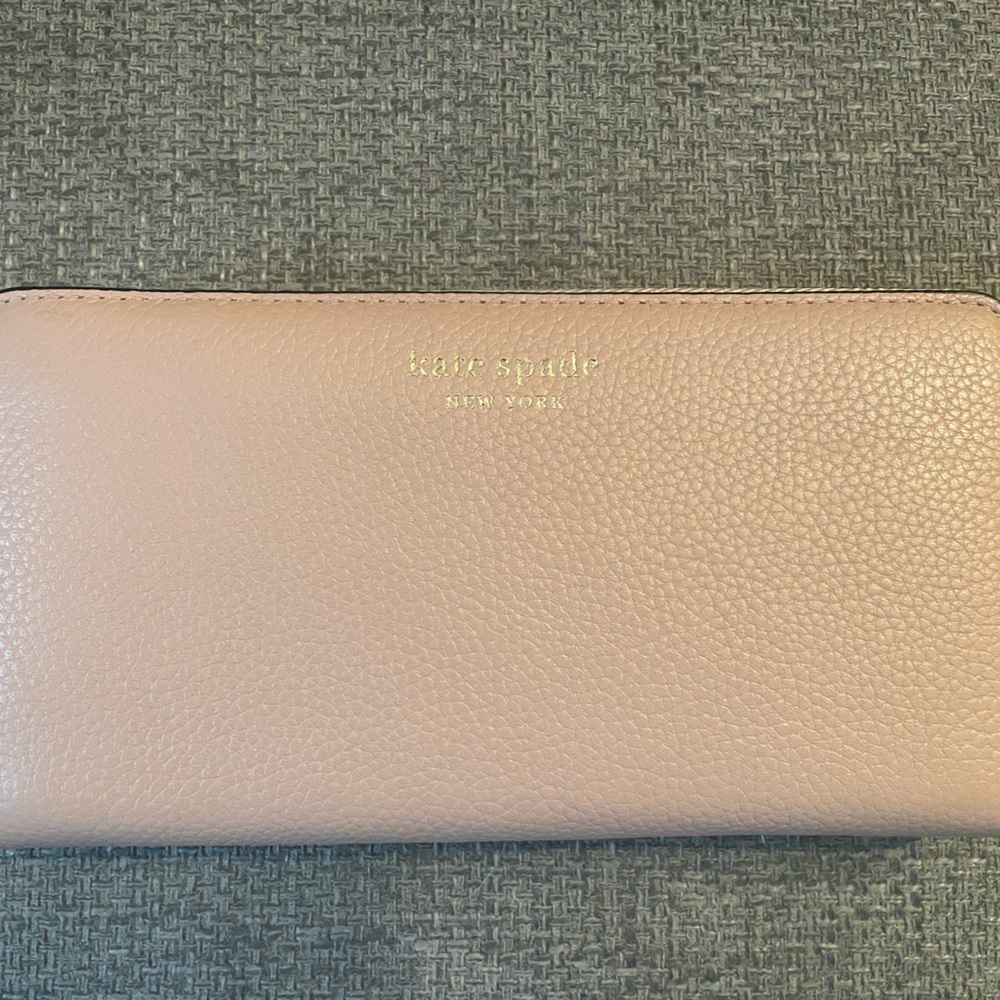 Blush pink pebbled leather Kate Spade wallet